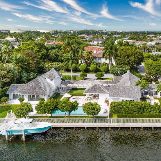 Waterfront estate with private boat dock on a canal